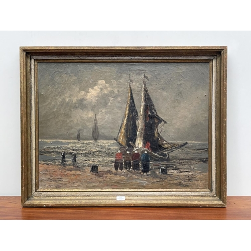 1155 - Karl Nordstrom (1855-1923) Sweden, fishing boats on shore with figures, oil on canvas, approx 59 cm ... 