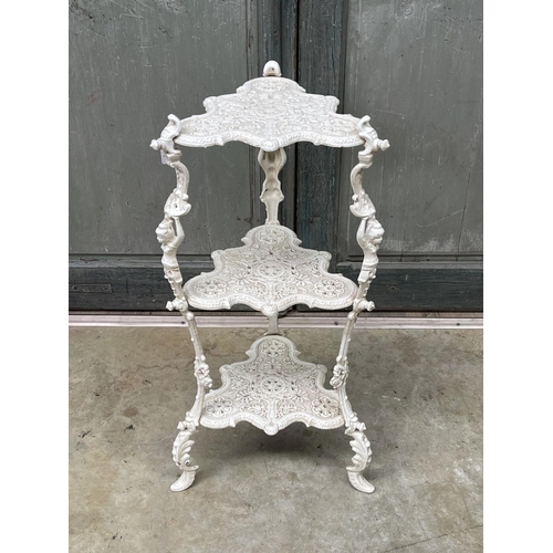 1189 - Tri legged three tier cast iron plant stand, approx 76cm H x 35cm W