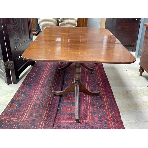 1107 - Antique English Regency mahogany twin pedestal table, with extra leaf, brass clips, approx 190 cm lo... 