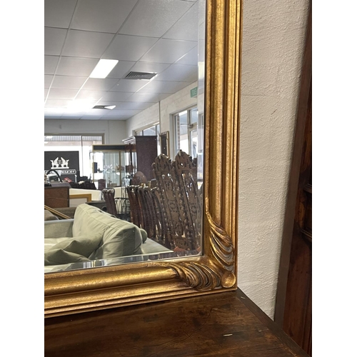 1141 - Antique style modern gilt framed bevelled glass wall mirror, approx 138cm H x 107cm W