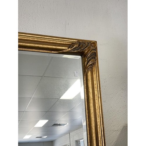 1141 - Antique style modern gilt framed bevelled glass wall mirror, approx 138cm H x 107cm W