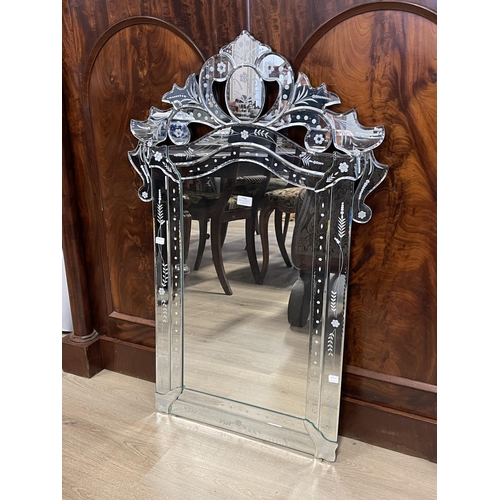 1159 - Venetian style shaped surround wall mirror, approx 103cm x 69cm