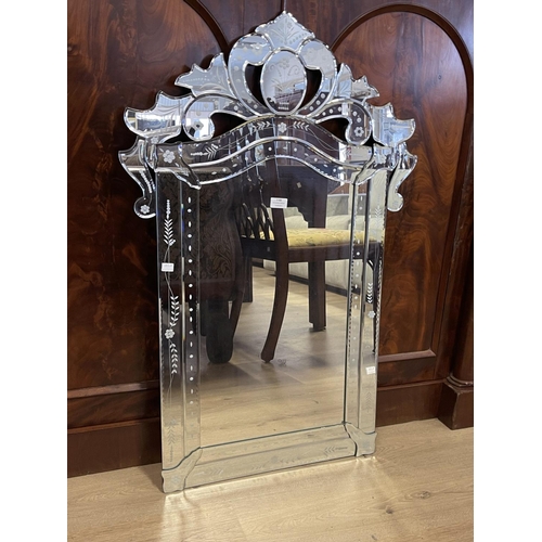 1159 - Venetian style shaped surround wall mirror, approx 103cm x 69cm