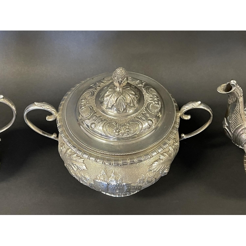 1163 - Antique sterling silver four piece tea & coffee service, each of baluster shape, and repousse worked... 