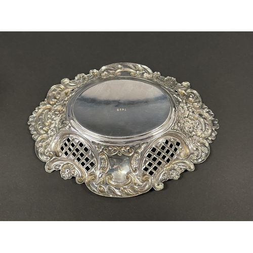 1164 - Sterling silver hallmarked English silver repousse bowl and pierced nut dish, approx 15cm W & smalle... 