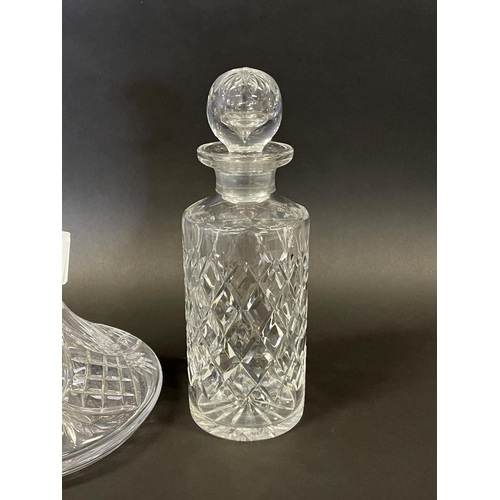 1165 - Good quality cut crystal ships decanter along with a cylinder example, each approx 26cm H (2)