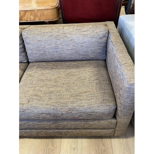 1195 - Modern charcoal coloured upholstered four seater couch, approx 230cm W