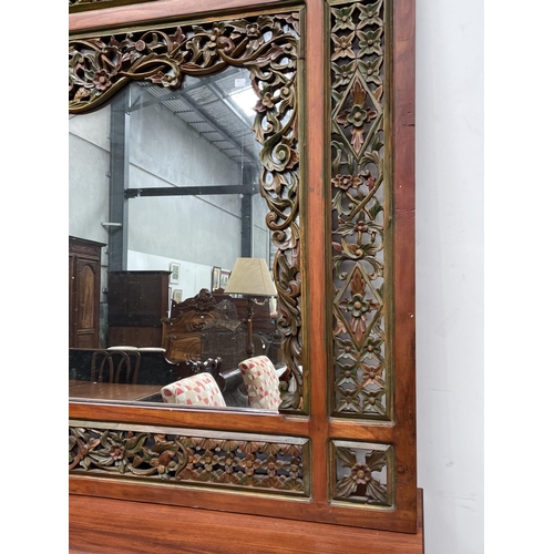 1197 - Large Balinese carved and pierced wood mirror, approx 156cm H x 176cm W