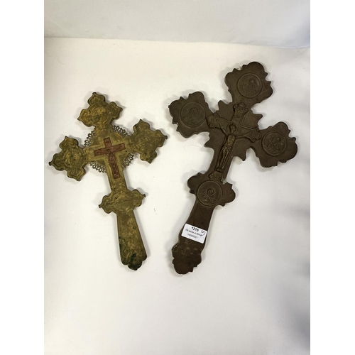 1215 - Two antique brass crosses, approx 38cm x 22cm & smaller (2)