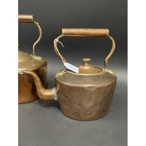21 - Two antique English copper and brass kettles, approx 28cm H & shorter (2)