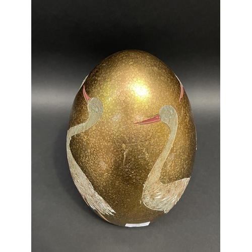 32 - Decorative egg shaped ornament, decorated with incised waterbirds, approx 32cm H