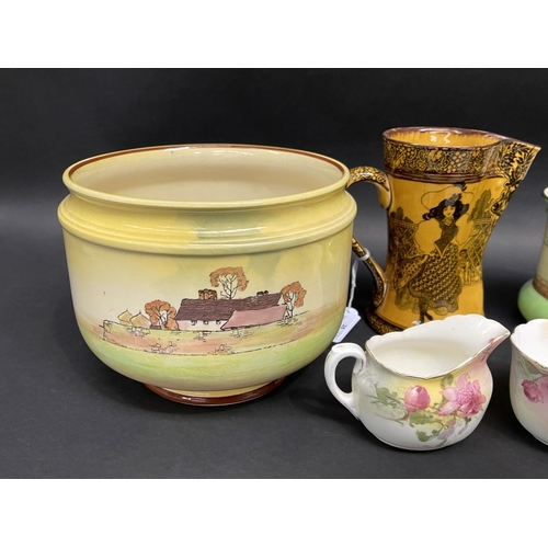 35 - Assortment of Royal Doulton to include vases, jug, bowl, creamer, sugar, etc,  Morrisian , Dutch Har... 
