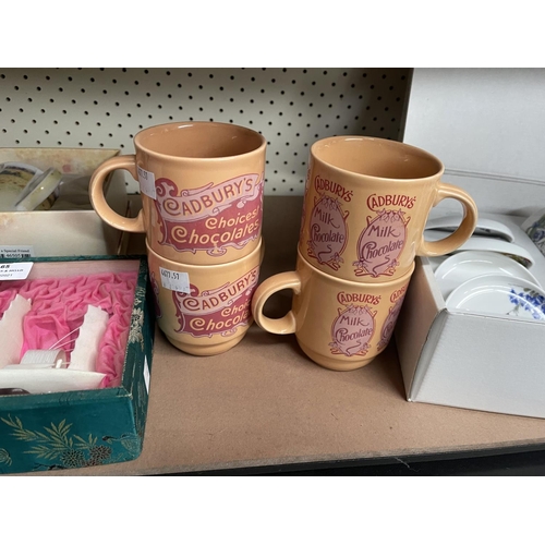 65 - Assortment of mugs to include Australian wildflowers, Cadbury Chocolate mugs, etc