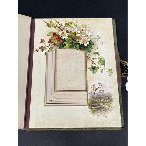 96 - Antique leather bound embossed Art Nouveau photo album with clasp, approx 28cm x 23cm x 6cm
