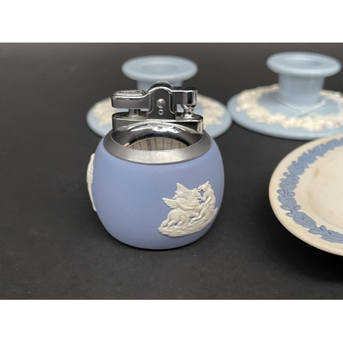 135 - Wedgwood blue jasper cigarette lighter, cigarette pot, ashtrays and candle holder, approx 5cm H and ... 