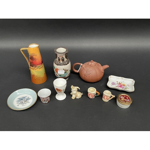 159 - Assortment to include Royal Doulton jug with sheep, egg cup, Sylvac Dog, two Lancaster miniature cha... 