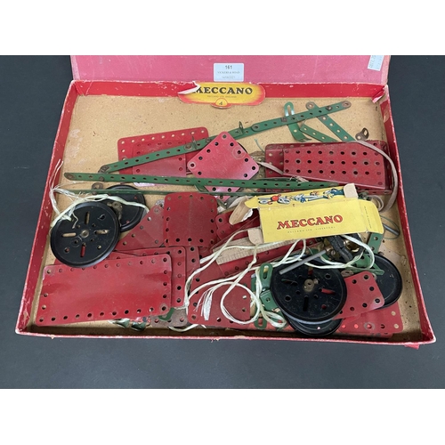 161 - Vintage part No 4 Meccano pieces in original box, with instruction booklet