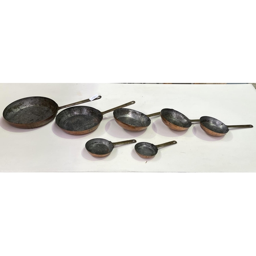 177 - Set of 7 graduated copper frypans, approx 23.5cm Dia and smaller (7)