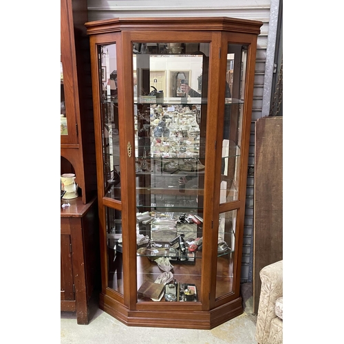181 - Modern canted side display cabinet with light, approx 183cm H x 98cm W