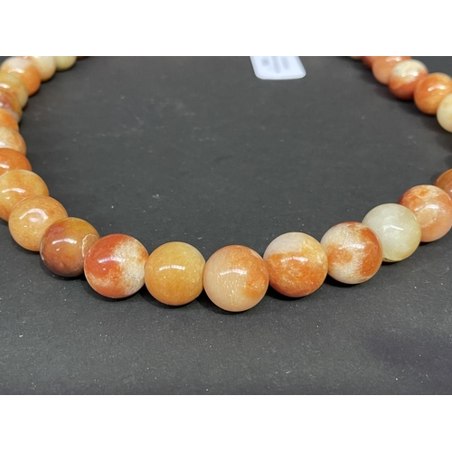 194 - Strand of agate ball beads