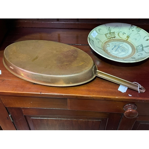 209 - Large oval copper fry pan, approx 59cm Long including handle