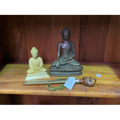 214 - Shoe horn with netsuke finial along with two Buddha's. One Indian and the other made from soap stone... 