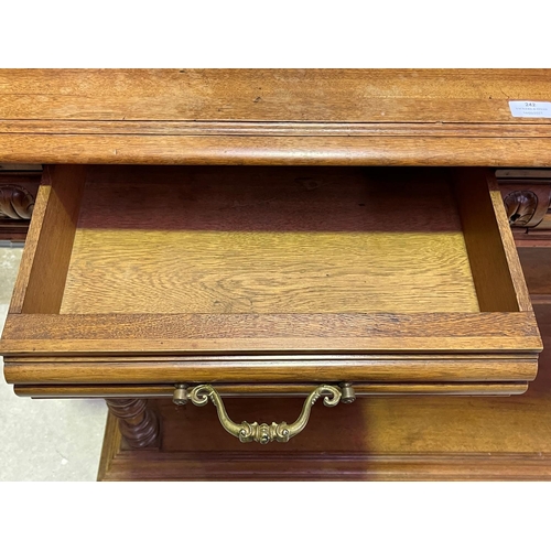 242 - Antique French Henri II revival walnut servery, with lift up top, marble inset surface, and shelf, t... 