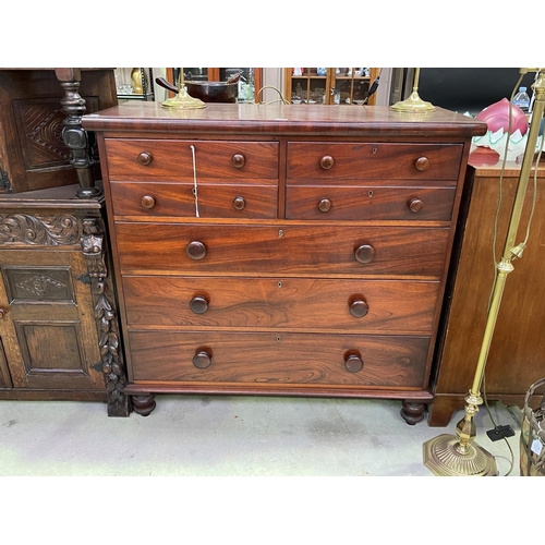 249 - Antique Australian cedar five drawer chest with key on turned feet, approx 125cm W x 120cm H