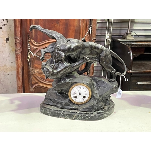 269 - French patinated spelter fighting tiger clock on marble base, with pendulum and key, approx 37cm H x... 