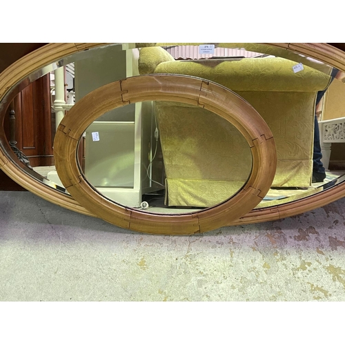 275 - Two oval pine mirrors, approx 110cm W and smaller (2)