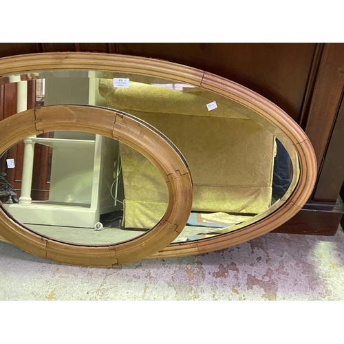 275 - Two oval pine mirrors, approx 110cm W and smaller (2)