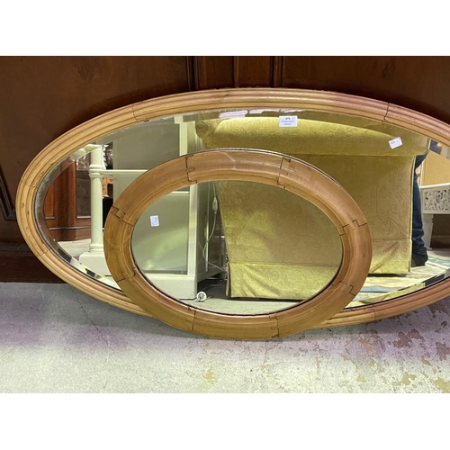 275 - Two oval pine mirrors, approx 110cm W and smaller (2)