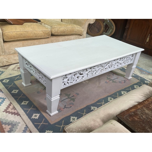 276 - White painted teak coffee table, approx 150cm L x 64cm