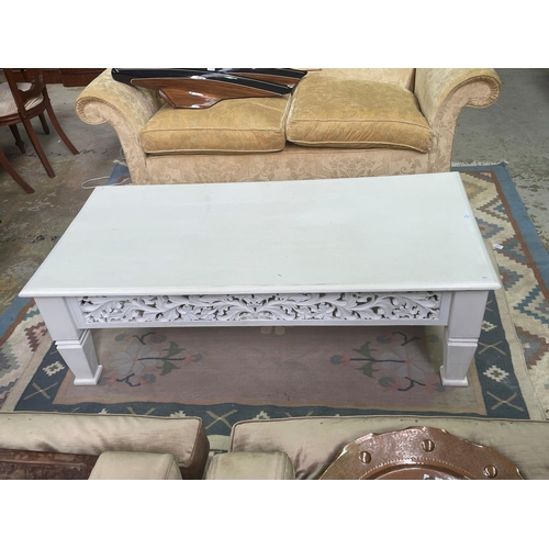 276 - White painted teak coffee table, approx 150cm L x 64cm