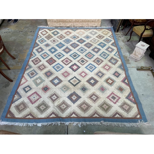 279 - Two wool rugs, soft pastel tones, approx 290cm x 238cm and 194cm x 124cm (2)