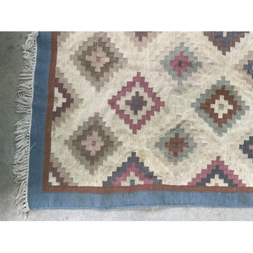 279 - Two wool rugs, soft pastel tones, approx 290cm x 238cm and 194cm x 124cm (2)