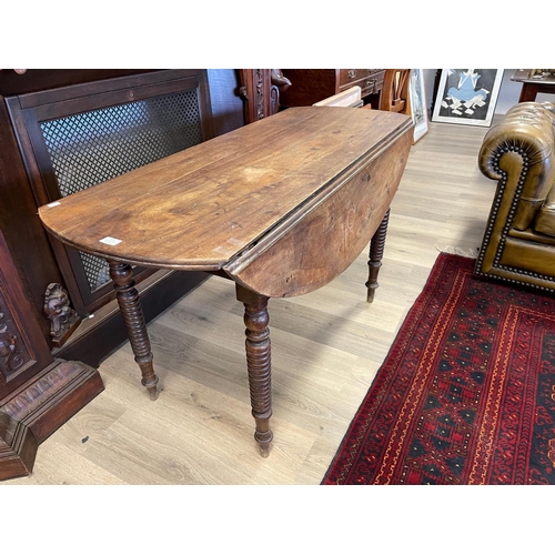 1216 - Rustic Antique Walnut drop side table standing on multi ring turned legs, approx 132 cm long x 101 c... 