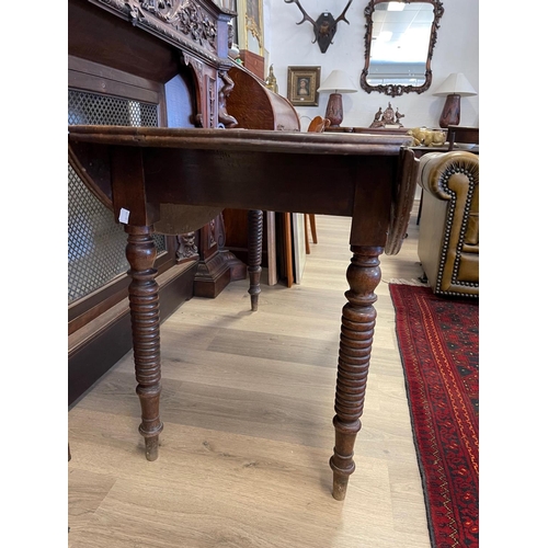 1216 - Rustic Antique Walnut drop side table standing on multi ring turned legs, approx 132 cm long x 101 c... 