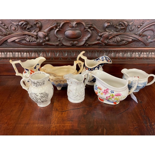 1235 - Selection of antique English porcelain and pottery jugs, approx 10cm H x 16cm W & smaller (7)