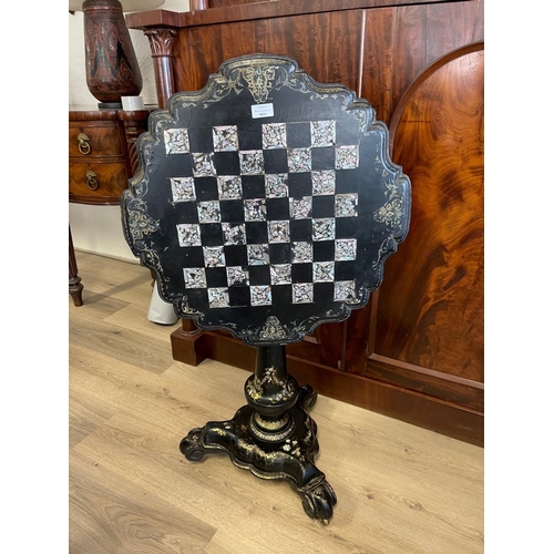 1236 - Antique mid Victorian paper Mache games table, with snap top inlaid with mother of pearl, and painte... 