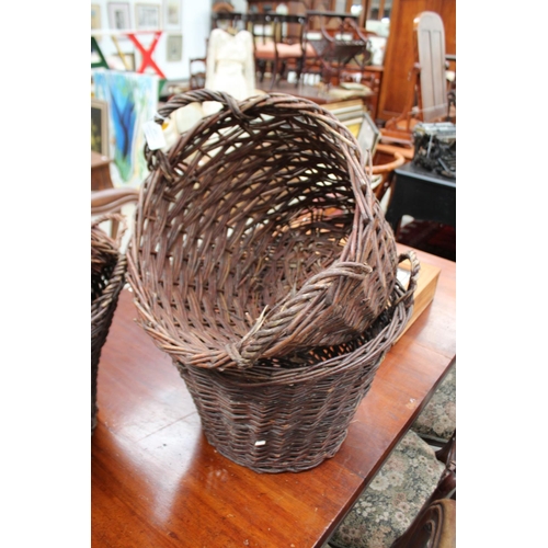 473 - Four twin handle baskets, approx 60cm W and smaller (4)