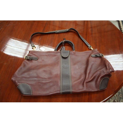 479 - Nobuck leather over night bag, approx 69cm W