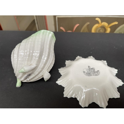 123 - Antique Belleek shell form creamer and a Belleek pin dish, both with black print (2)