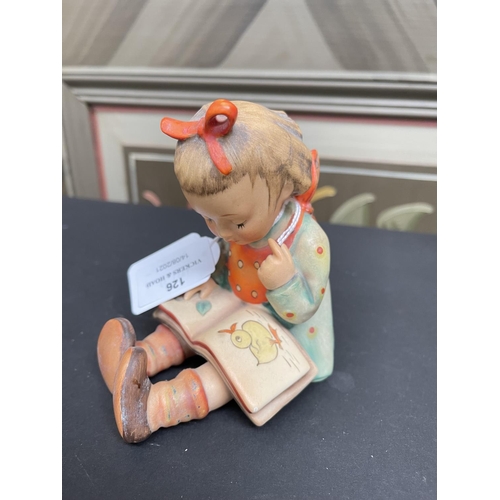 126 - Hummell figure of a girl reading seated, approx 12cm H