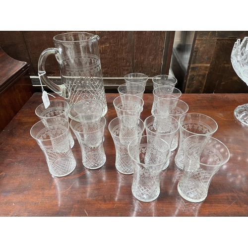 221 - Pall Mall water jug and fifteen glasses, approx 22cm H and smaller (16)