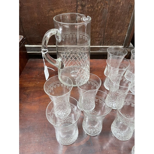 221 - Pall Mall water jug and fifteen glasses, approx 22cm H and smaller (16)