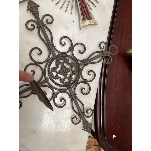 244 - Three metal crosses, one with drop down candle sconce pan, approx 57cm and smaller (2)