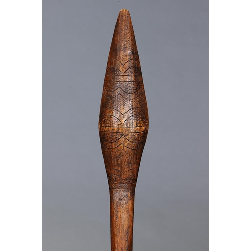 1086 - EARLY ELONGATED BULBOUS CLUB, VICTORIA, Carved and engraved hardwood (with custom stand) Elongated b... 