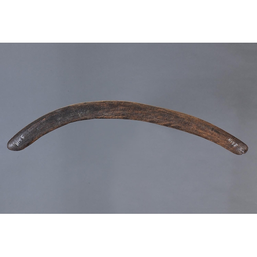 1200 - EARLY BOOMERANG, NEW SOUTH WALES, Carved hardwood (no custom stand) Of thin bi-convex section and su... 