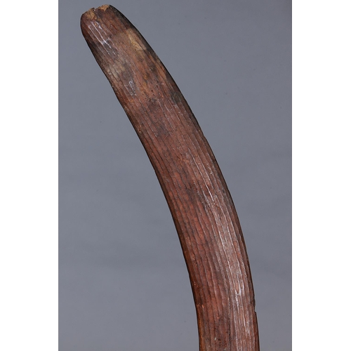 1208 - EARLY HUNTING BOOMERANG, CENTRAL AUSTRALIA, NORTHERN TERRITORY, Carved hardwood and natural pigments... 